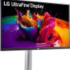 Front view of LG 27UP550N-W 27" 4K UHD Monitor in white. Side profile showcasing the slim design of the LG 27UP550N-W monitor. Back panel displaying HDMI, DisplayPort, USB-C, and USB-A ports on the LG 27UP550N-W monitor. LG 27UP550N-W monitor on a desk setup with dual-screen configuration. Close-up of the ergonomic stand with tilt, pivot, and height adjustments on the LG 27UP550N-W monitor. LG 27UP550N-W monitor displaying vibrant visuals with sRGB 98% color gamut