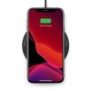 PAD10W wireless charger on desk charging iPhone
